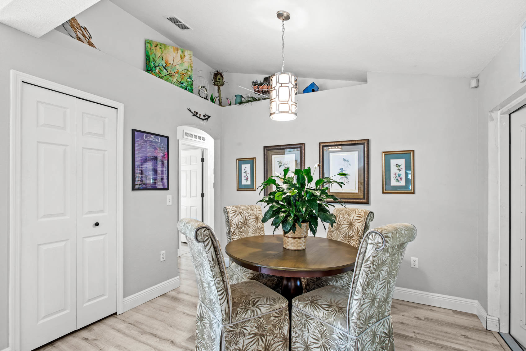 dining area with table and four chairs